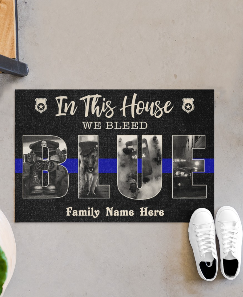 Personalized in this house we bleed blue doormat